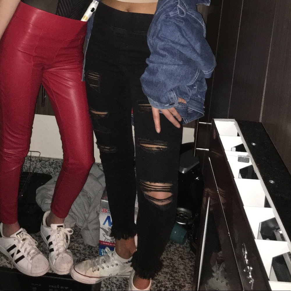 Mid Rise Ripped Black Jeggings with Frayed Bottom